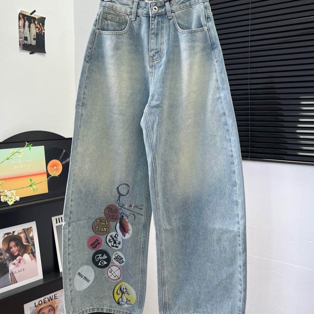 Miu Miu Badge adorned wide leg trousers